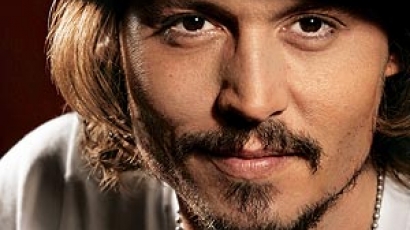 Depp Oscar-díjas rendezővel fog forgatni?