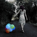 girl-walking-colorful-balloona.jpg
