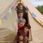 One-Direction-Live-While-Were-Young-music-video-tent-pile-400x300.jpg