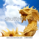 stock-photo-chinese-dragons-statue-with-cloud-and-blue-sky-clipping-path-138659867.jpg