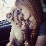 bella kutyájával