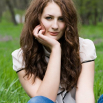 depositphotos_24371749-stock-photo-girl-sitting-in-the-grass.jpg