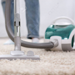 59793225-cleaning-carpet-with-vaccum-cleaner-at-home.jpg