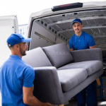 Packers-and-movers-in-Jamnagar-loading-furniture-in-the-truck.jpg